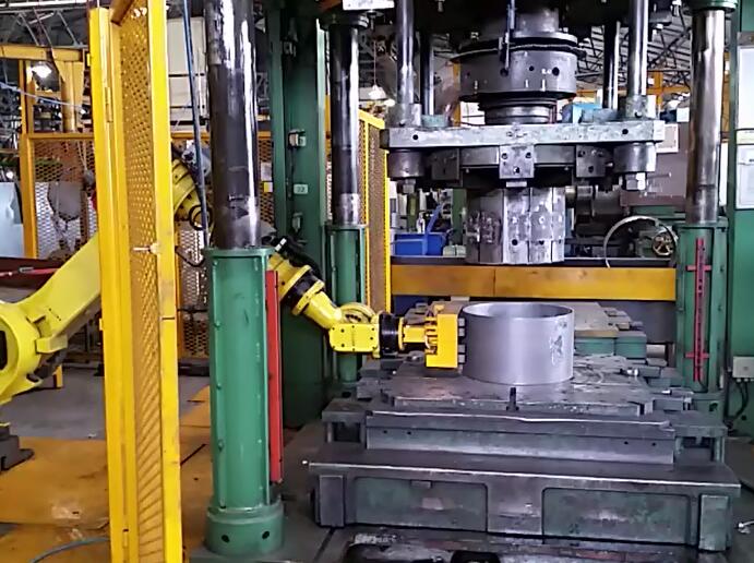 Machine tending robot positioning steel workpiece with magnetic gripper - HVR MAG
