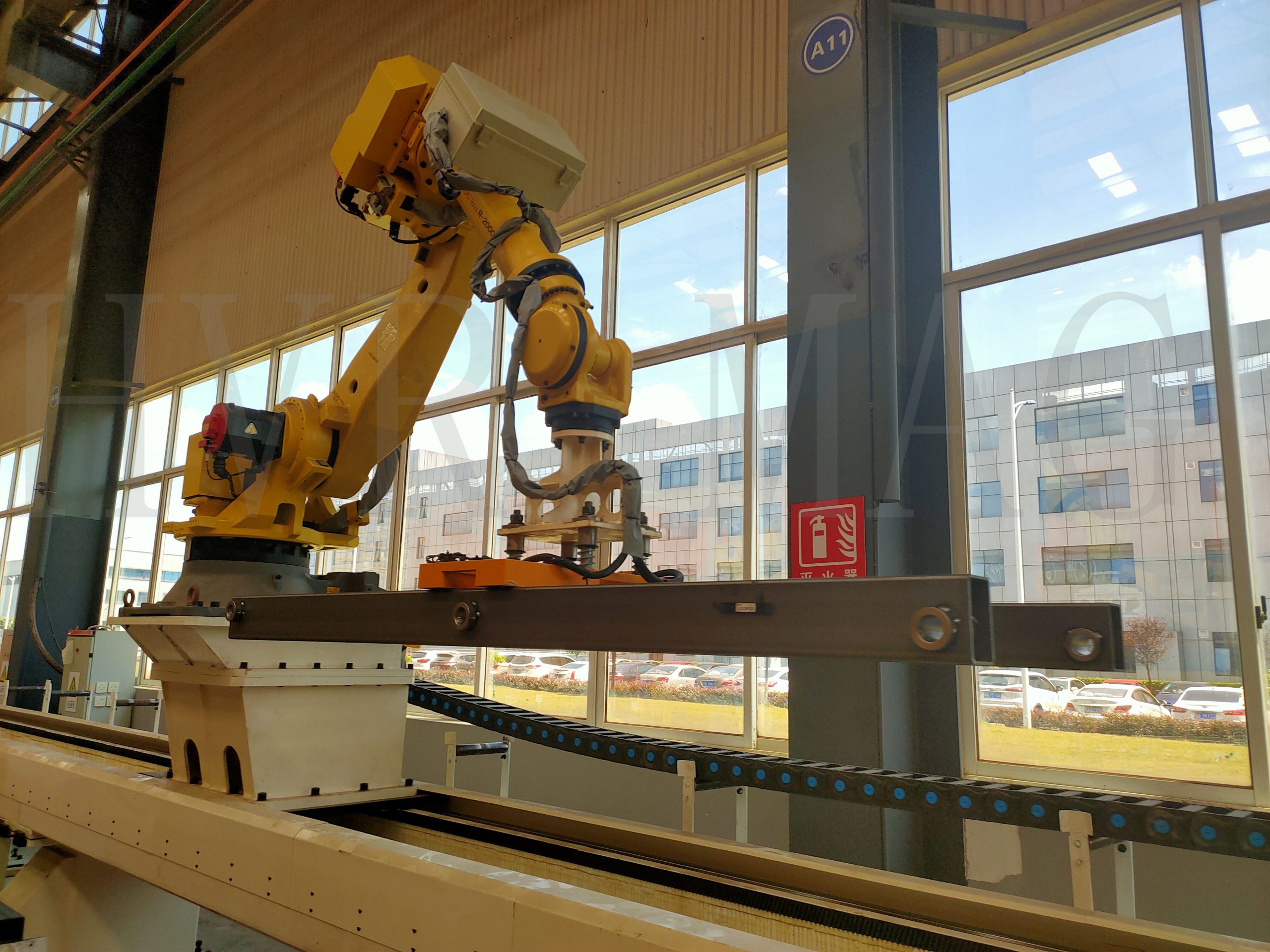 Permanent electromagnetic robot gripper handling steel workpiece - HVR MAG