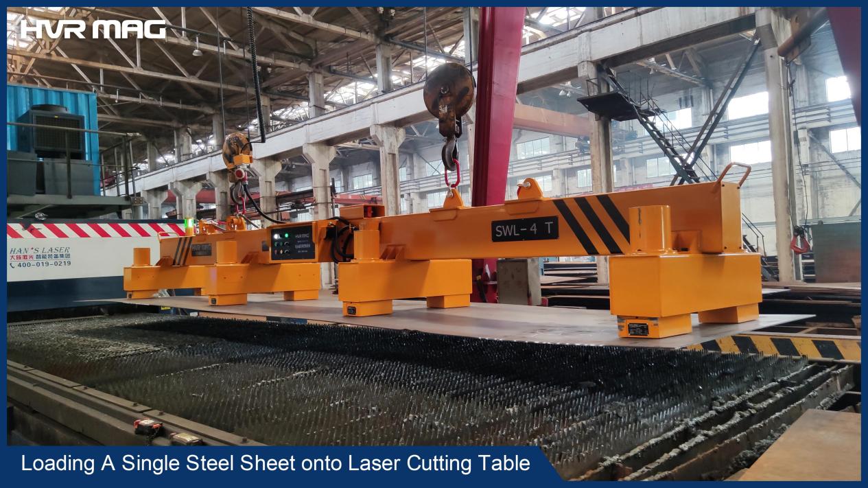 Loading steel sheet onto laser cutting table with magnetic lifting beam from HVR MAG