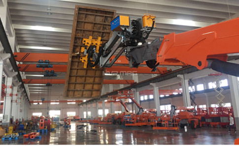 Lifting Concrete Forms with Battery Powered Steel Handling Magnets on A Boom Lift 