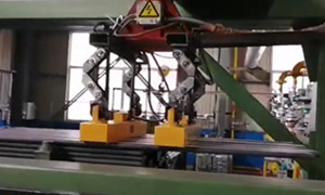 Magnetic Grippers on Robotic Gantry System Handling Steel Tubes