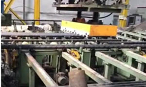 Magnetic Grippers on Gantry Robot Palletizing 7 Steel Tubes 